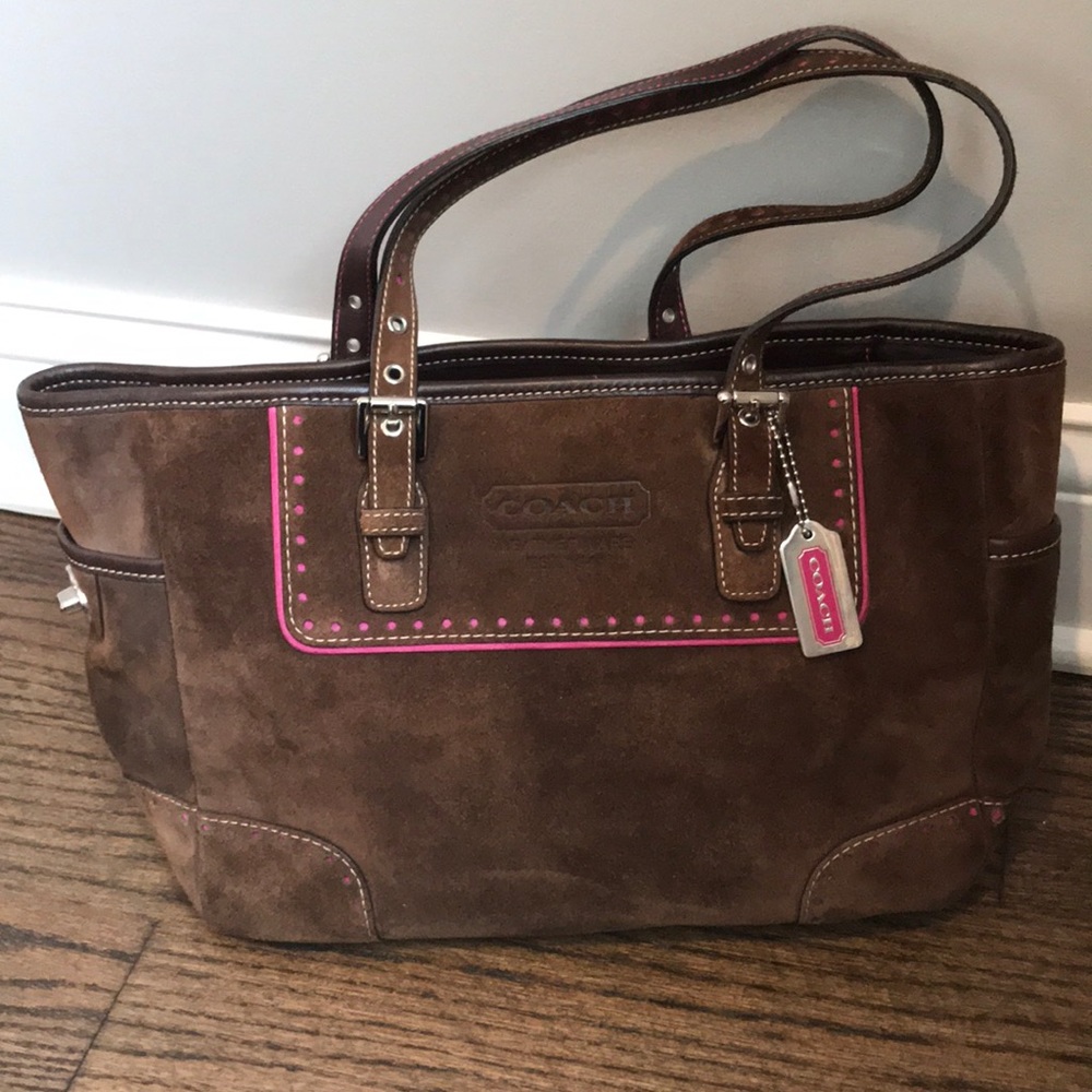 Brown suede coach bag with hot pink details